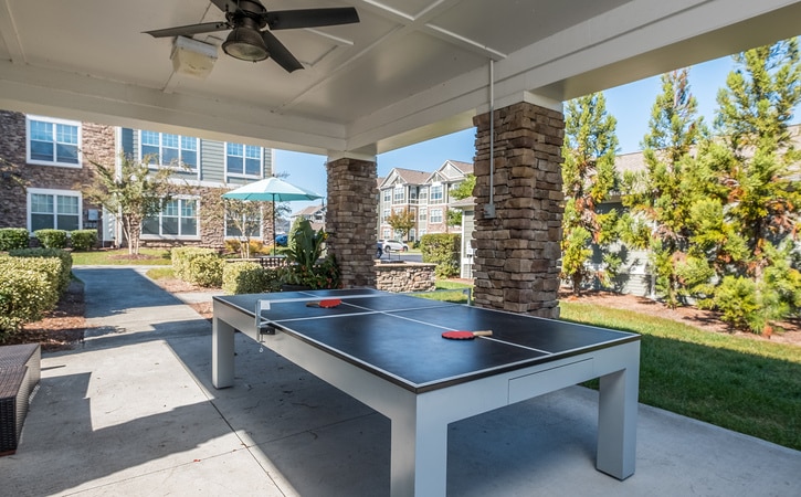 OUTDOOR GAMING AND LOUNGE SPACES 2  VIEW AT LEGACY OAKS