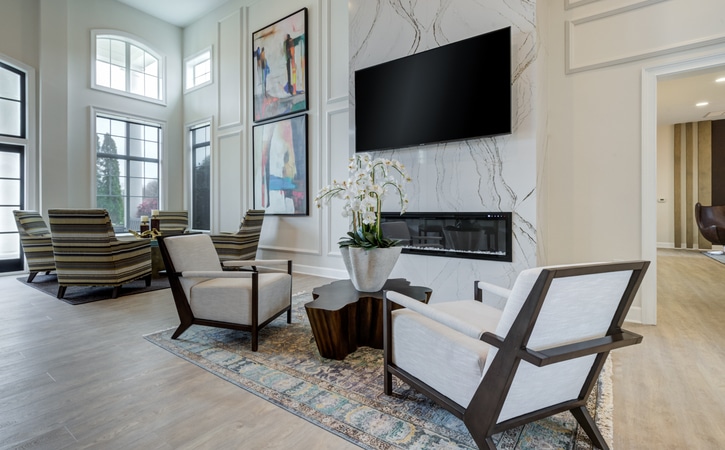 View At Legacy Oaks Apartment Homes in Knightdale NC Renovated Clubhouse Lounge Seating Area with Fireplace