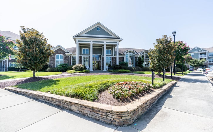 View at Legacy Oaks Apartments Knightdale NC Leasing Office and Clubhouse Entrance